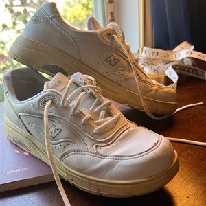 White New Balance tennis shoes